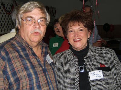 Tim is making the rounds catching up. He strikes up a conversation with Linda Griner (Class of '68).