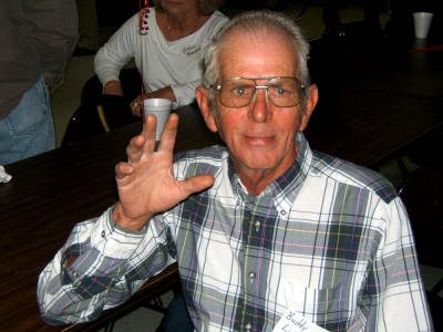 "Hi everybody!" Buddy Lindsey (Class of '61) waves to the crowd.
