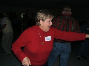 "That's me???" Sue McCumbers can't believe her eyes. Yep, that's her selling tickets at the Pal Theater in Lyons in 1965, almost 40 years ago.