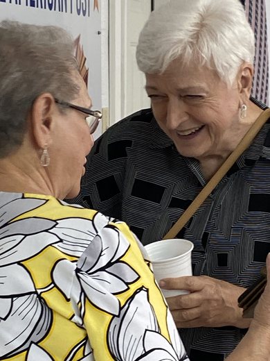 Audrey tells Betty one of those "you won't believe this happened" stories.