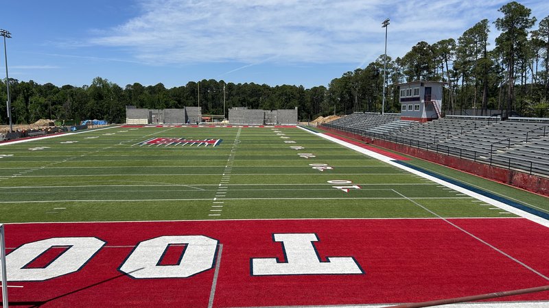 Two new field houses being built in the north end zone.