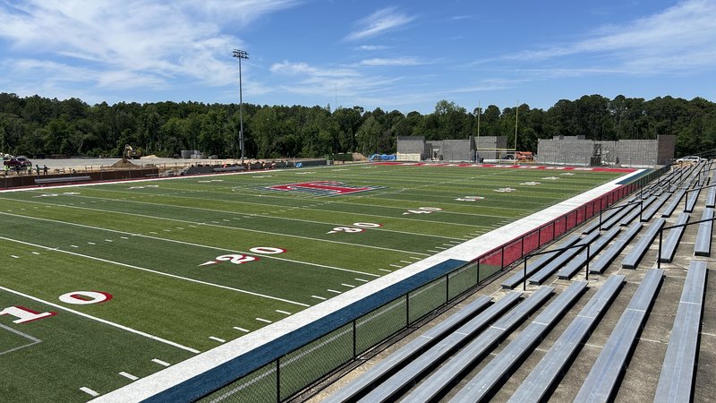 Two new field houses being built in the north end zone.