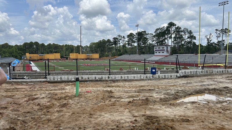 Two new field houses being built in the north end zone.